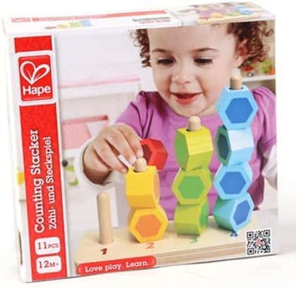 Counting stacker toy in box with multicolor hexagon blocks and wooden base