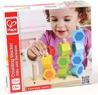 Counting stacker toy in box with multicolor hexagon blocks and wooden base