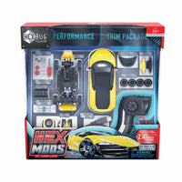 RC racing car mod kit in retail box with yellow car and accessory modules