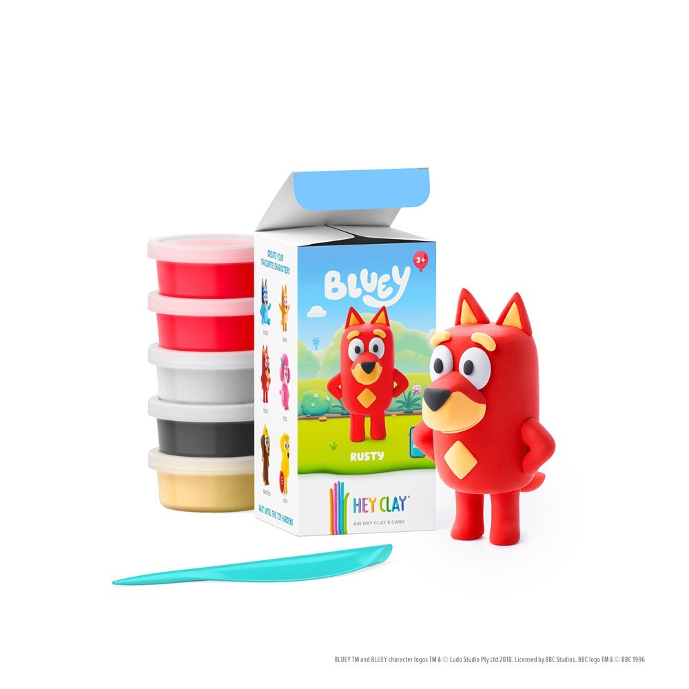 Clay set with red character figurine, stacked clay pots, and blue sculpting tool