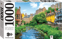 1000-piece jigsaw puzzle box by Mindbogglers with illustrated Edinburgh buildings and river