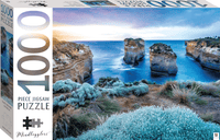 1000-piece jigsaw puzzle of Australian coast with blue water and rock archway