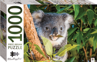 Jigsaw puzzle box with koala in leaves and “1000” piece count on the side