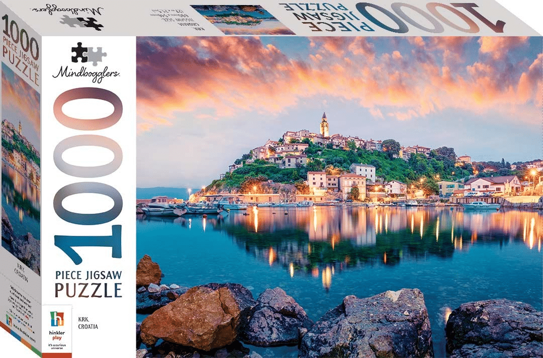 1000-piece jigsaw puzzle box with scenic coastal town and sunset artwork
