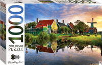 1000-piece jigsaw puzzle box with colorful houses by a river and sky reflection