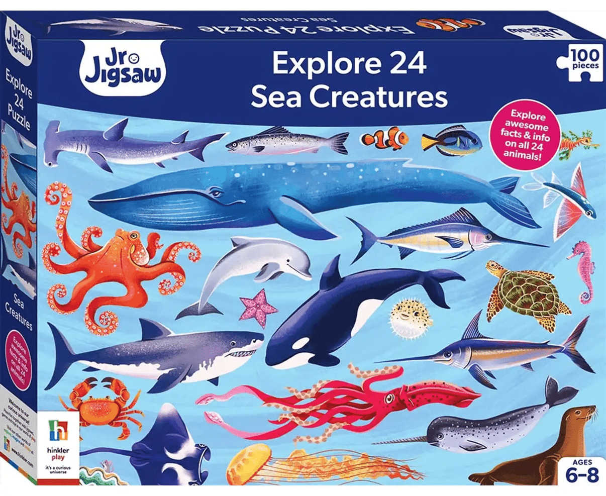 100-piece sea creatures jigsaw puzzle in box, featuring whales, sharks, and octopus
