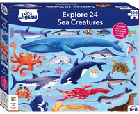100-piece sea creatures jigsaw puzzle in box, featuring whales, sharks, and octopus