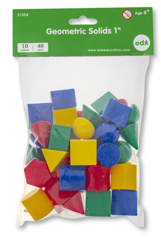 Packaged geometric solids set with colorful cubes, cones, cylinders, and spheres