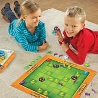 Kids playing a green and orange board game with purple mouse tokens