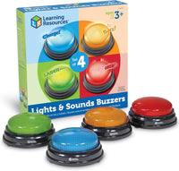 Set of 4 light-up answer buzzers shown with colorful domes in retail box.