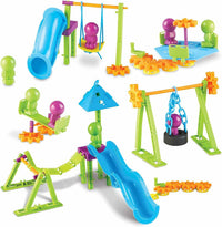 Colorful playground building set with swinging chain, slide, and gear pieces