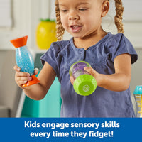 Child holding three colorful fidget tubes with glitter, beads, and sand inside