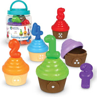 Counting cupcakes toy with colorful cupcake bases and numbered pop-in candles