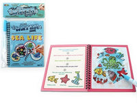 Magic water art book with sea life illustrations, open pages with colorful underwater creatures