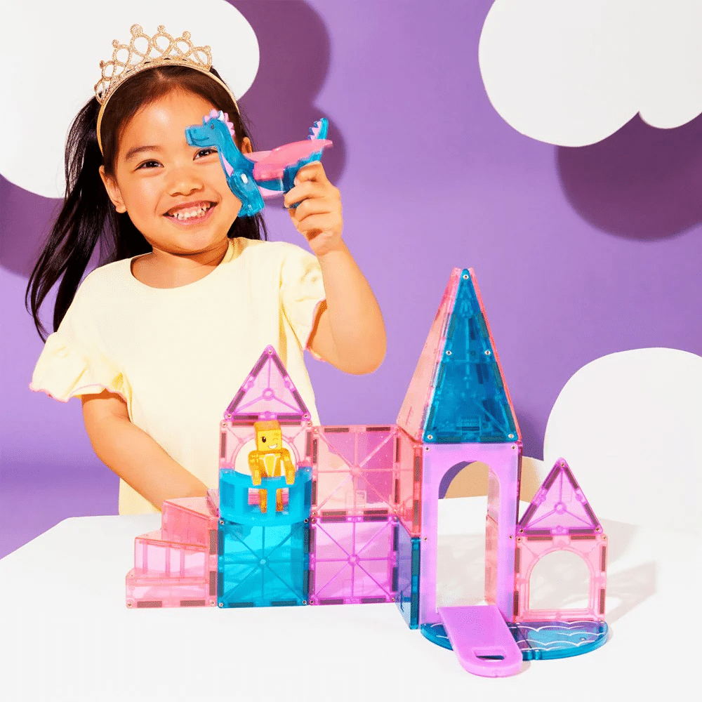 Magna Tiles castle building set with transparent pink, blue, and purple pieces