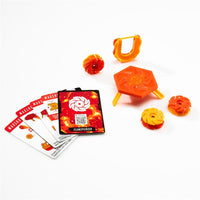 Magnetic trick shot game kit with orange launcher, fire module, and matching pieces