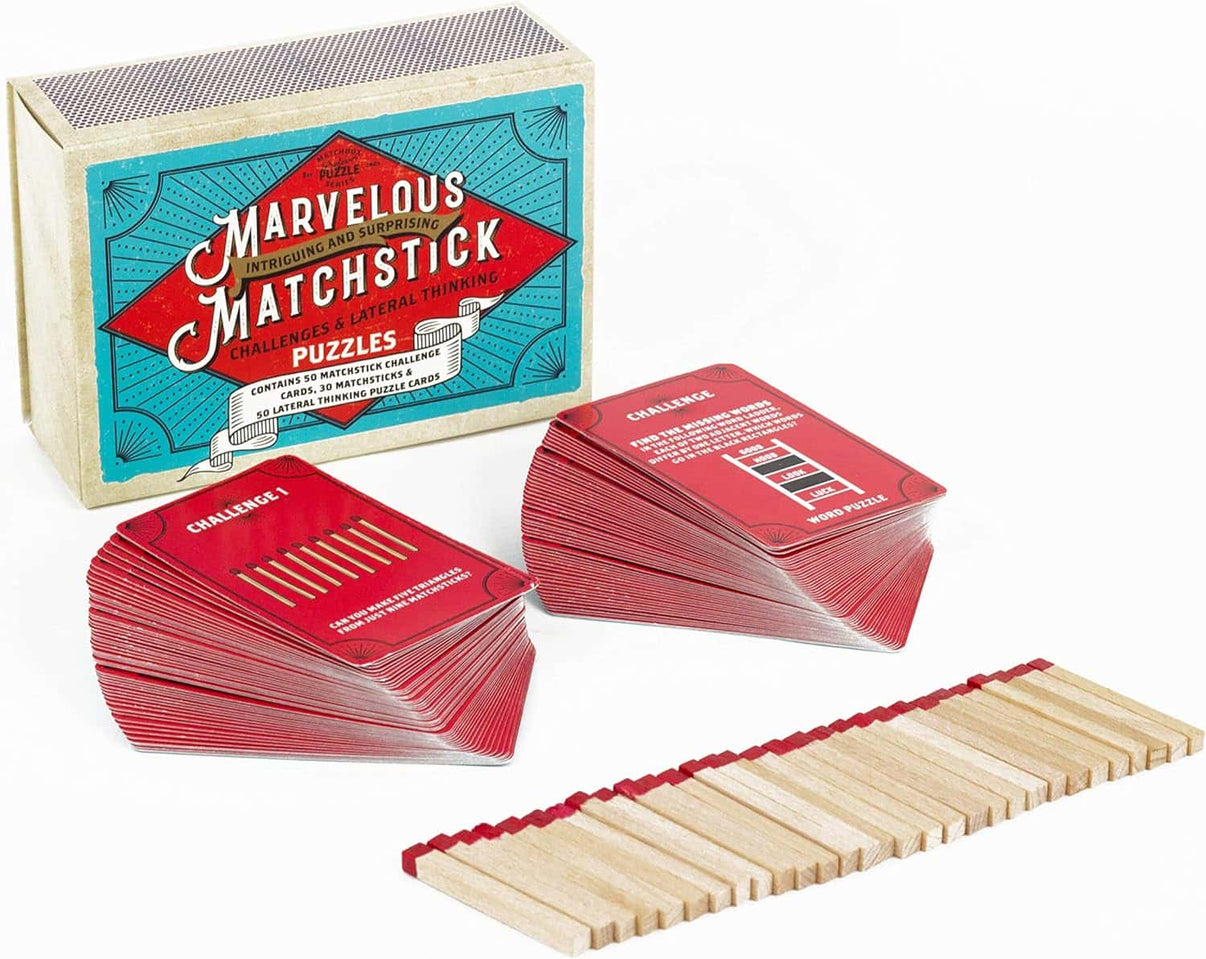 Matchstick puzzle set with boxed cards, stacks of wooden sticks with red tips
