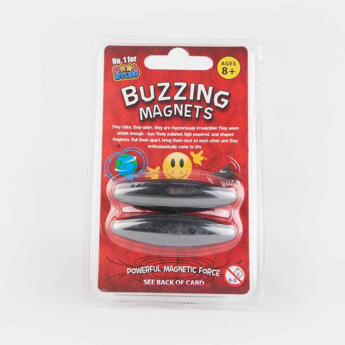 Magnet toy in blister pack with two black oval buzzing magnets