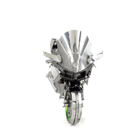 Metal motorcycle model with silver body and green accents, front view