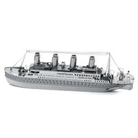 Metal Earth Titanic ship model: gray hull, smokestacks, railings, lifeboats