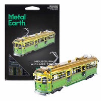 W Class tram metal model in yellow and green, front three-quarter view