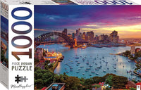 1000-piece jigsaw puzzle box featuring Sydney Harbour skyline and harbor boats
