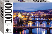 1000-piece jigsaw puzzle box with Prague river bridge illustration