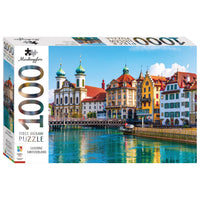 1000-piece jigsaw puzzle box with Lucerne waterfront colorful buildings