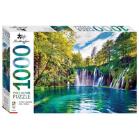 1000-piece jigsaw puzzle box with Plitvice waterfall landscape and trees