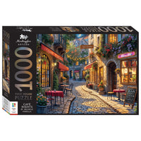 1000-piece jigsaw puzzle box showing cafe street artwork in warm evening lights