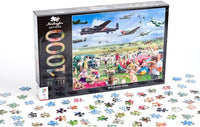 1000-piece jigsaw puzzle box with airplane-themed art and scattered pieces
