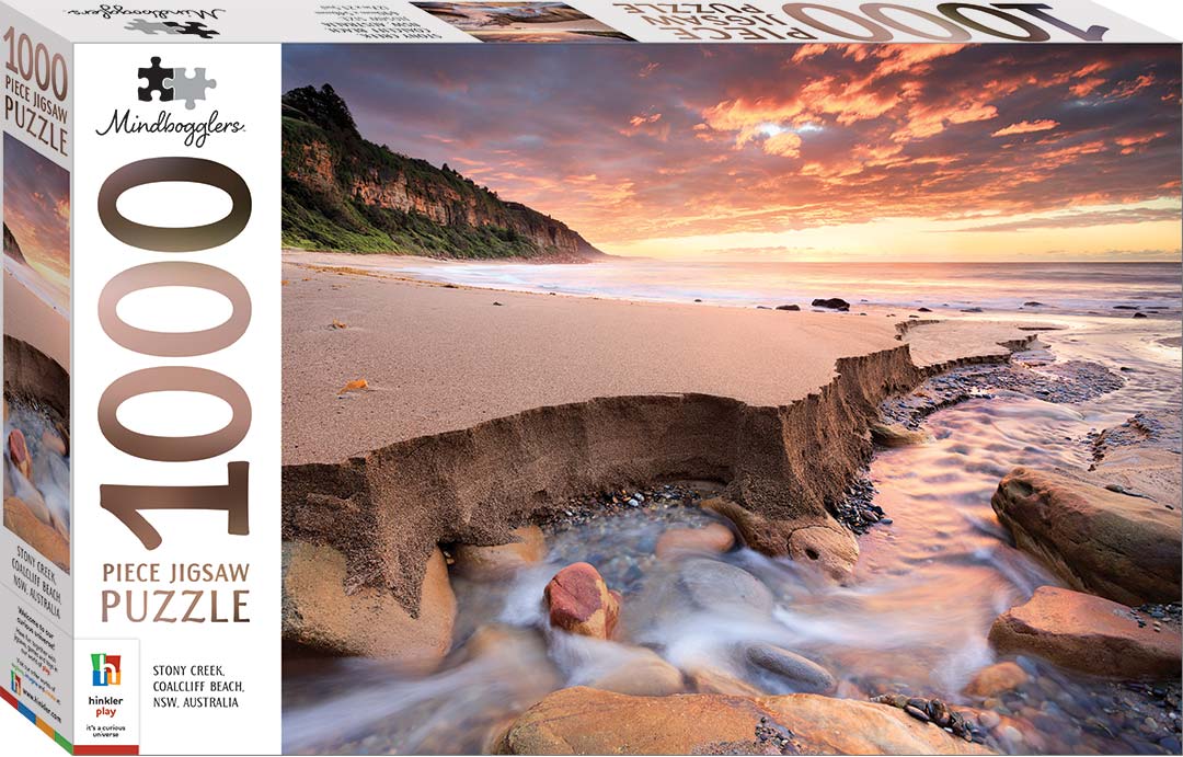 Mindbogglers 1000-piece jigsaw puzzle box, coastal rock and wave scene