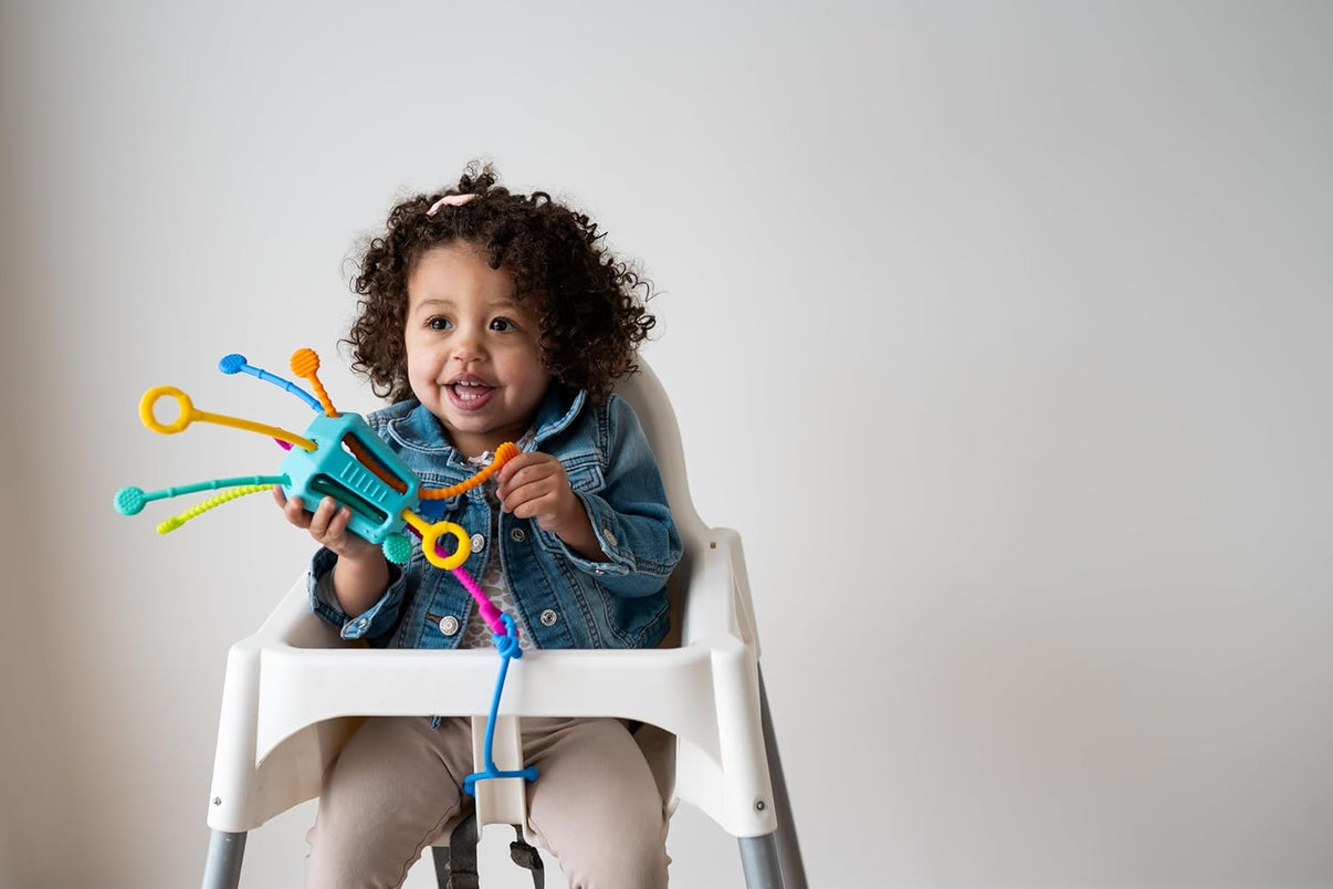 Sensory activity toy with colorful pegs and bead-like knobs on a turquoise base