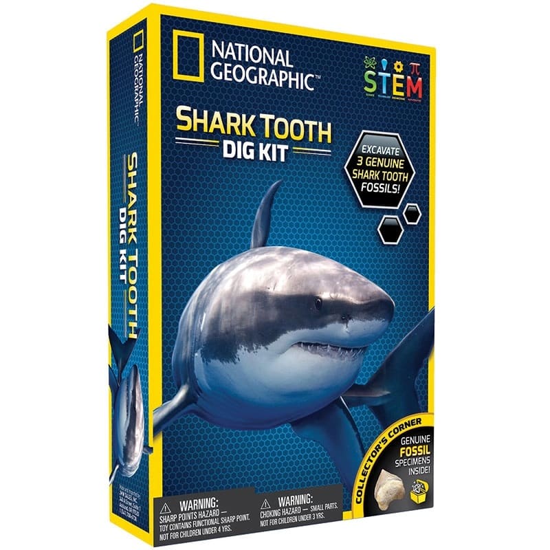 National Geographic Shark Tooth Dig Kit box, blue and yellow with shark graphic.