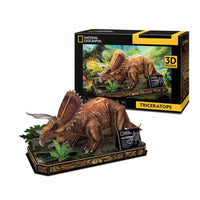 3D paper model kit with a brown Triceratops dinosaur and jungle base
