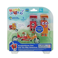 Retail box showing two Numberblocks figures, tandem bicycle, and included pieces