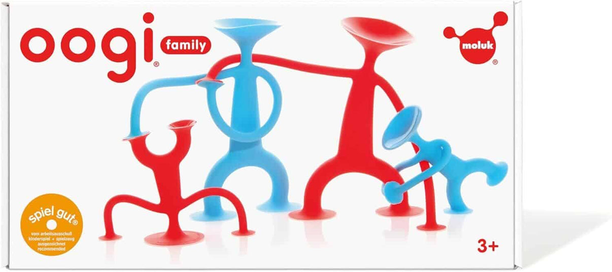 Toy construction set box showing blue and red animal-shaped pieces, Moluk branding