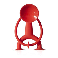 Oogi by Moluk red suction toy figure with circular handle and curved arms