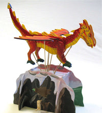 Painted wooden flying dragon automaton model with tall stand and rocky base