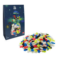 Plus-Plus Glow Mix 300-piece building set box with loose multicolor glow blocks