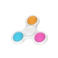 Pop spinner fidget toy with white three-lobed hand grip and orange, blue, pink discs