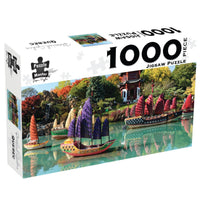 1000-piece jigsaw puzzle box, botanical gardens scene with boats and pagoda.