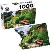 Puzzle Master 1000-piece jigsaw puzzle box with green countryside landscape art