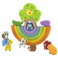 Rainbow balancing blocks set with wooden animals on multicolor rainbow arch
