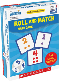 Scholastic Roll and Match math game box with number dice tiles 1–4 and yellow banner