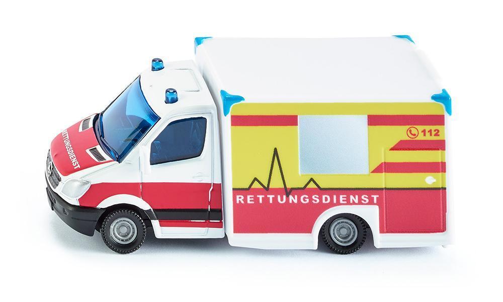 Toy ambulance van in white, red, and yellow with emergency markings and siren lights