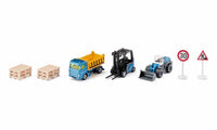 Toy construction set with trucks, forklift, yellow loader bucket, pallets and signs