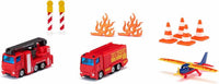 Red fire brigade toy truck with flame graphics, orange cones, and striped candles