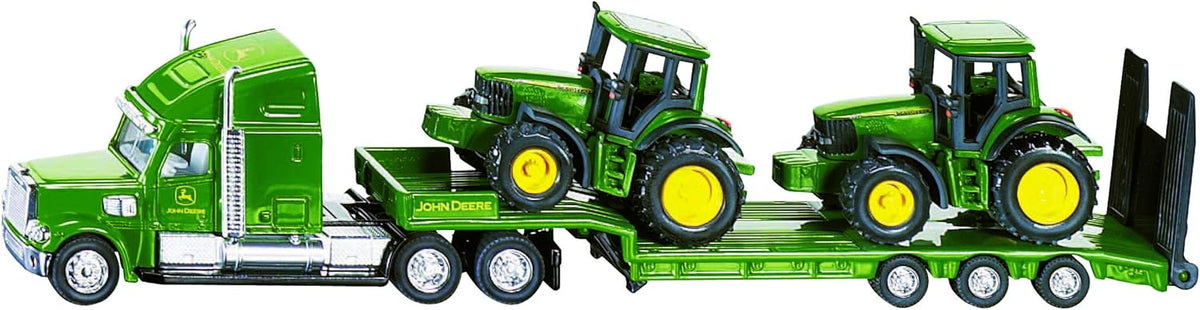 Green John Deere low-loader truck toy with tractor on trailer, 1:87 scale.