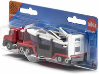 Siku toy low loader truck in red with blue trailer carrying a boat, in retail blister